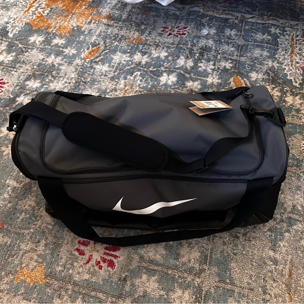 Grey Nike duffle bag
